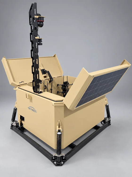 RIDGE with both doors open, a raised camera mast and a solar panel