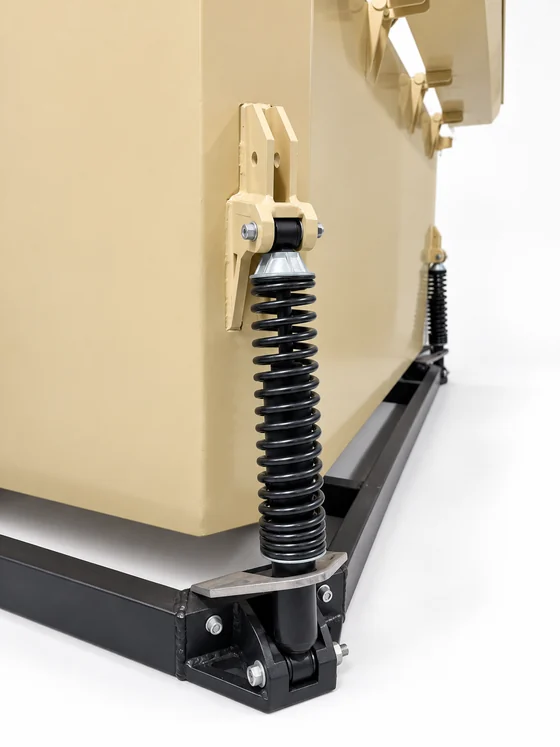 Close-up of the RIDGE spring and shock absorber on the base frame